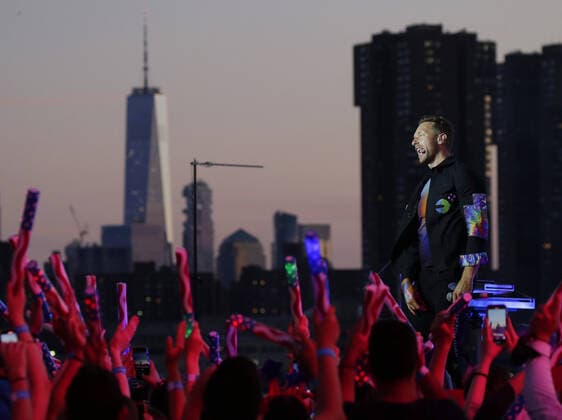 Chris Martin and Coldplay perform during a taped free concert in front of One World Trade Center and the Manhattan skyline for Macy s Fourth of July special in New York City on Thursday, June 17, 2021.  NYP20210617133 JohnxAngelillo