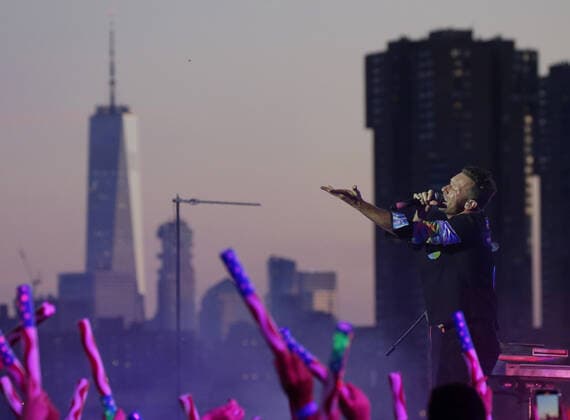 Chris Martin and Coldplay perform during a taped free concert in front of One World Trade Center and the Manhattan skyline for Macy s Fourth of July special in New York City on Thursday, June 17, 2021.  NYP20210617134 JohnxAngelillo