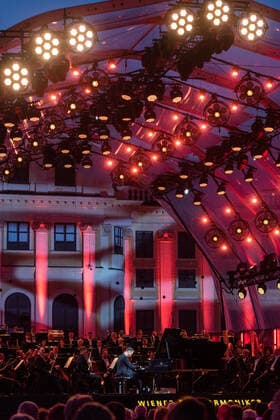 (210619) -- VIENNA, June 19, 2021 -- Pianist Igor Levit performs on the stage during the Summer Night Concert at the Schoenbrunn Palace in Vienna, Austria, June 18, 2021. The Summer Night Concert 2021 was staged on Friday by the Vienna Philharmonic Orchestra at the Schoenbrunn Palace, a world heritage site in Vienna. About 3,000 spectators are allowed to watch the concert face to face after the COVID-19 restrictions were partially lifted. ) AUSTRIA-VIENNA-SUMMER NIGHT CONCERT GuoxChen 