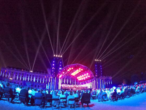 (210619) -- VIENNA, June 19, 2021 -- The Vienna Philharmonic Orchestra performs during the Summer Night Concert at the Schoenbrunn Palace in Vienna, Austria, June 18, 2021. The Summer Night Concert 2021 was staged on Friday by the Vienna Philharmonic Orchestra at the Schoenbrunn Palace, a world heritage site in Vienna. About 3,000 spectators are allowed to watch the concert face to face after the COVID-19 restrictions were partially lifted. ) AUSTRIA-VIENNA-SUMMER NIGHT CONCERT GuoxChen 