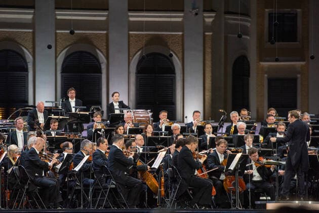 (210619) -- VIENNA, June 19, 2021 -- The Vienna Philharmonic Orchestra performs during the Summer Night Concert at the Schoenbrunn Palace in Vienna, Austria, June 18, 2021. The Summer Night Concert 2021 was staged on Friday by the Vienna Philharmonic Orchestra at the Schoenbrunn Palace, a world heritage site in Vienna. About 3,000 spectators are allowed to watch the concert face to face after the COVID-19 restrictions were partially lifted. ) AUSTRIA-VIENNA-SUMMER NIGHT CONCERT GuoxChen 