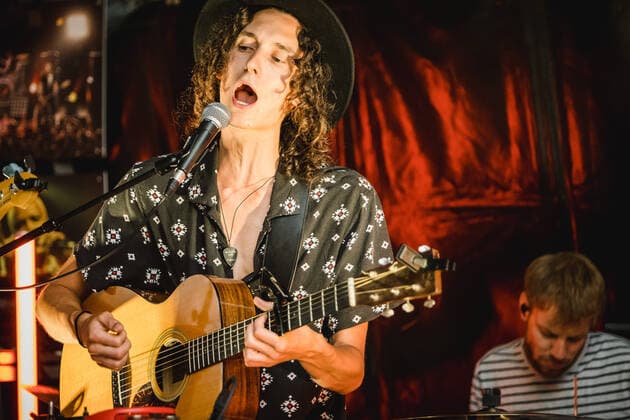 Daens live in Bern, Switzerland Bern, Switzerland. 18th, June 2021. The Swiss band Daens performs a live garden concert at Bierh?beli in Bern. Here singer and musician Daniel Beltrametti is seen live on stage. Bern Switzerland  Copyright: xGonzalesxPhoto TilmanxJentzschx