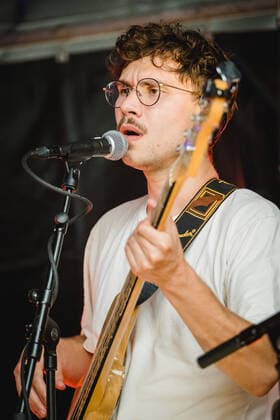 Daens live in Bern, Switzerland Bern, Switzerland. 18th, June 2021. The Swiss band Daens performs a live garden concert at Bierh?beli in Bern. Here bass player Tom Horat is seen live on stage. Bern Switzerland  Copyright: xGonzalesxPhoto TilmanxJentzschx