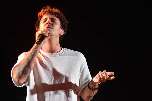 June 20, 2021, Calafell, Tarragona, Spain: Singer Jxta Martin performs at the Calafell Beach Festival..The Spanish singer Jxta Martin acts as a supporting artist before the performance of Antonio Orozco at the Calafell Beach Festival. The young singer Jxta Martin became known on platforms such as Tik Tok (with more than 35 thousand followers), Instagram, YouTube or Spotify, Due to his talent, he has already attracted the interest of musical media, acting in events on radio stations such as Los 40 Principles and playing on dials such as Canal Fiesta Radio. Calafell Spain - ZUMAs197 20210620_zaa_s197_045 Copyright: xRamonxCostax
