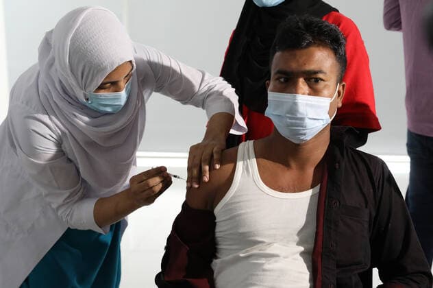 Virus Outbreak Bangladesh A man receives a first dose of Pfizer-BioNTech Covid-19 coronavirus vaccine in Dhaka, Bangladesh, on June 21, 2021. Dhaka Bangladesh ramany-notitle210621_npA1Q  Copyright: xSonyxRamanyx