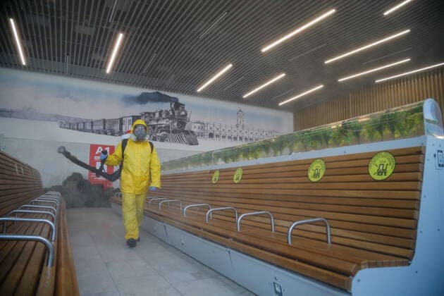 (210624) -- MOSCOW, June 24, 2021 -- A municipal employee wearing a protective suit disinfects a railway station in Moscow, Russia, on June 24, 2021. Russia logged 20,182 new coronavirus infections over the past 24 hours, the highest daily increase since Jan. 24, taking the nationwide tally to 5,388,695, the official monitoring and response center said Thursday. (Photo by Xinhua) RUSSIA-MOSCOW-COVID-19-DISINFECTION AlexanderxZemlianichenkoxJr