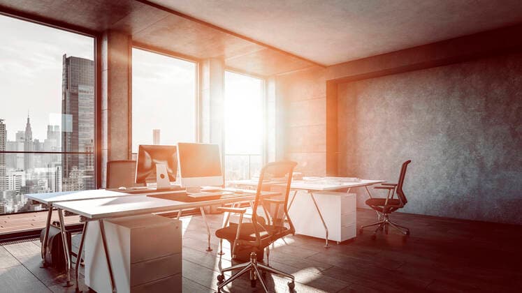 Interior of office with sunlight streaming through window property released SKGF00025