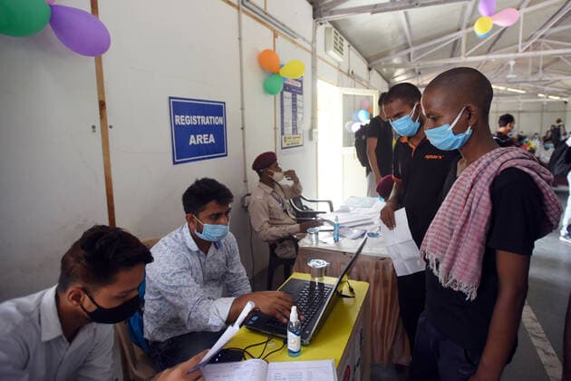 New Delhi, India - June 25, 2021: Homeless people registering to get inoculated against Covid-19 during a vaccination drive at a shelter, near Kashmere Gate, in New Delhi, India, on Friday, June 25, 2021. (Photo by Amal KS Hindustan Times) Covid Vaccination Camp For Homeless
