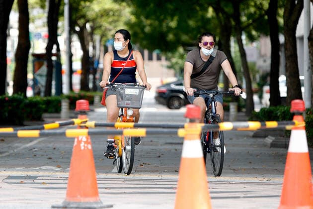 June 26, 2021, Taioei, Taipei, Taiwan: People riding a bicycle with masks seen in Taipei, as the island has reported its first locally acquired delta variant case of the coronavirus following a cluster linking to imported cases from India and Peru, with the government grappling with an ongoing outbreak. Taioei Taiwan - ZUMAs313 20210626_zip_s313_002 Copyright: xDanielxCengxShou-Yix