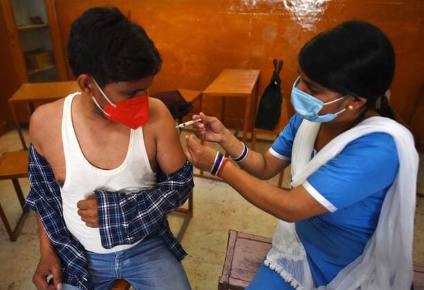 GURUGRAM, INDIA - JUNE 25: A beneficiary receives a dose of COVID-19 vaccine at a vaccination centre, on June 25, 2021 in Gurugram, India. (Photo by Vipin Kumar Hindustan Times) COVID-19 Vaccination Drive