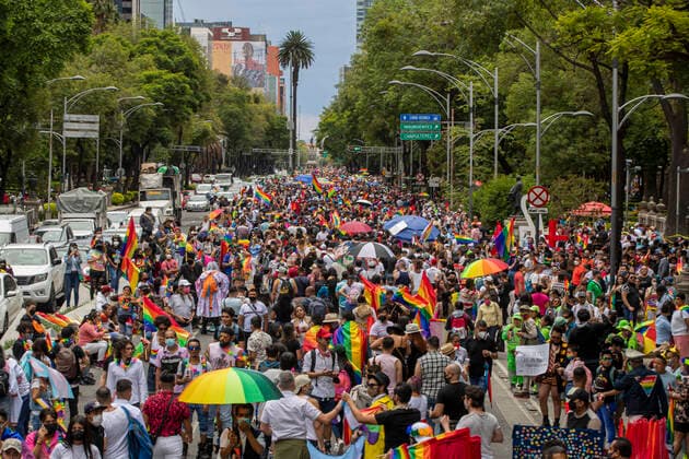 XLIII Edition Of LGBT+ Pride March In Mexico MEXICO CITY, MEXICO - JUNE 26: A group of LGBT community hold rainbow flags while takes part during the XLIII annual pride LGBT+ march on the main avenue demanding equality, in response to the injustice that trans+ people are facing in their daily life in all over the world. Thousands of Lesbian, Gay, Bisexual and Transsexual (LGBT) join the Pride march around the world. On June 26, 2021 in Mexico City, Mexico. Copyright: xRicardoxFloresx EYEPIXGROUP_RFE_26062021_9618