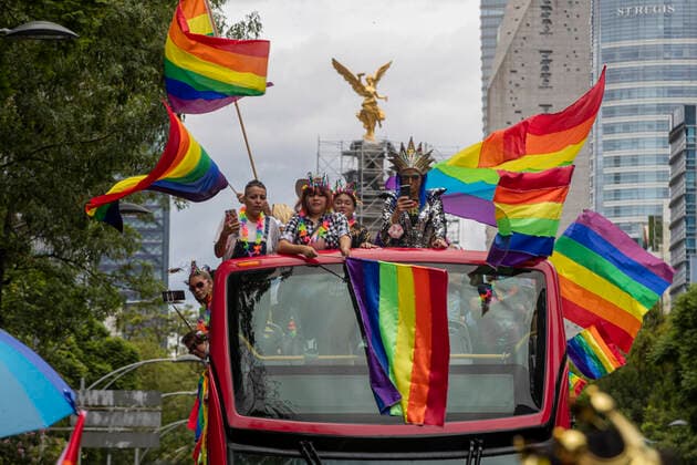 XLIII Edition Of LGBT+ Pride March In Mexico MEXICO CITY, MEXICO - JUNE 26: A person of LGBT community holds a rainbow flag while takes part during the XLIII annual pride LGBT+ march on the main avenue demanding equality, in response to the injustice that trans+ people are facing in their daily life in all over the world. Thousands of Lesbian, Gay, Bisexual and Transsexual (LGBT) join the Pride march around the world. On June 26, 2021 in Mexico City, Mexico. Copyright: xRicardoxFloresx EYEPIXGROUP_RFE_26062021_9622