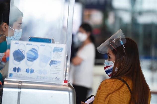 Thailand Plans To Reopen To Vaccinated Foreign Tourists Travelers wearing protective masks checked-in at the Suvarnabhumi International Airport amid a new wave of the coronavirus disease (COVID-19) pandemic in Bangkok, Thailand, 27 June 2021. Bangkok Thailand laowilas-notitle210627_npJEG  Copyright: xAnusakxLaowilasx