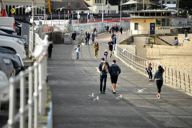 NSW CORONAVIRUS COVID19, People seen on the boardwalk at Bondi Beach in Sydney, Monday, June 28, 2021. More than five million people in Greater Sydney and its surrounds have gone into a 14-day lockdown as health authorities try to regain control of a coronavirus outbreak. ( NO ARCHIVING, EDITORIAL USE ONLY, NO USE IN BOOKS WITHOUT CONSENT SYDNEY NSW AUSTRALIA  Copyright: xJOELxCARRETTx 20210628001553158627