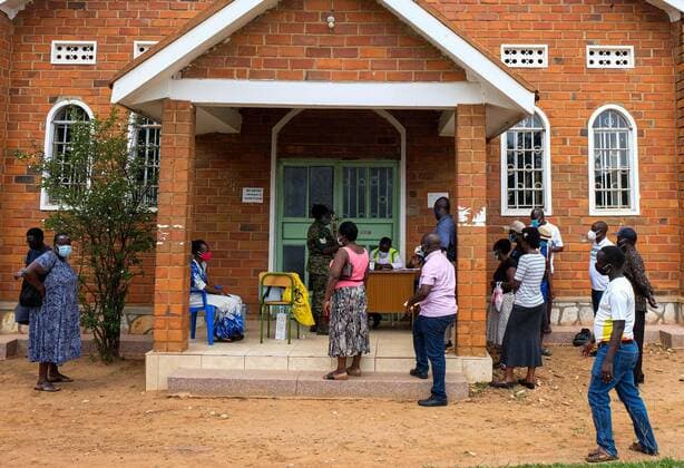 (210628) -- KAMPALA, June 28, 2021 -- People wait to receive the COVID-19 vaccine in Kampala, Uganda, on June 28, 2021. Uganda on Monday resumed COVID-19 vaccination for health workers and those due to receive a second AstraZeneca jab after a three-week suspension. (Photo by Hajarah Nalwadda Xinhua) UGANDA-KAMPALA-COVID-19-VACCINATION ZhangxGaiping 