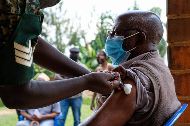 (210628) -- KAMPALA, June 28, 2021 -- A man receives his second dose of the COVID-19 vaccine in Kampala, Uganda, on June 28, 2021. Uganda on Monday resumed COVID-19 vaccination for health workers and those due to receive a second AstraZeneca jab after a three-week suspension. (Photo by Hajarah Nalwadda Xinhua) UGANDA-KAMPALA-COVID-19-VACCINATION ZhangxGaiping 