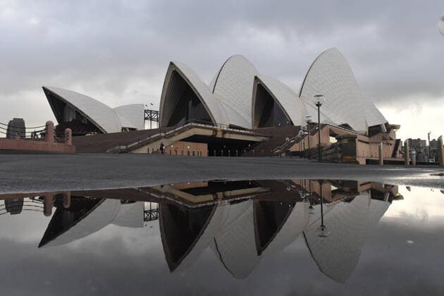 NSW CORONAVIRUS COVID19, The Sydney Opera House is seen reflected in a rain puddle in Sydney, Tuesday, June 29, 2021. More than five million people in Greater Sydney and its surrounds have gone into a 14-day lockdown as health authorities try to regain control of a coronavirus outbreak. ( NO ARCHIVING, EDITORIAL USE ONLY, NO USE IN BOOKS WITHOUT CONSENT SYDNEY NSW AUSTRALIA  Copyright: xMICKxTSIKASx 20210629001553443993