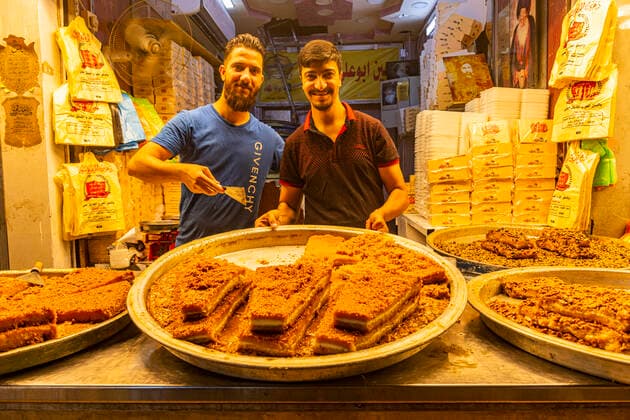 Locals selling sweets, Imam Ali Holy Shrine, Najaf, Iraq, Middle East Copyright: MichaelxRunkel 1184-5767 Editorial Use Only