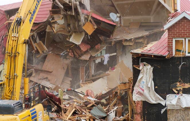 June 30, 2021, sherbrooke, PQ, Canada: A crane demolishes the Hells Angels bunker in Sherbrooke, Que. on Wednesday, June 30, 2021. The bunker was the site of some notorious crimes during the biker war during the mid 1980 s in Quebec. sherbrooke Canada  - ZUMAc35_ 20210630_zaf_c35_023 Copyright: xPaulxChiassonx