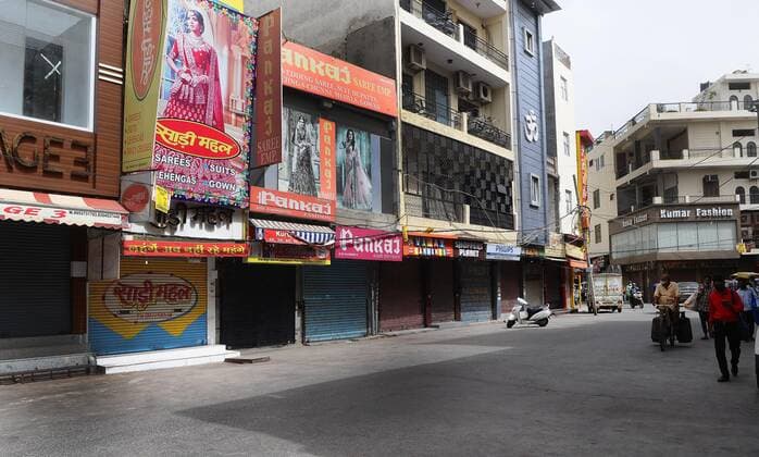 NEW DELHI, INDIA - JUNE 30: Laxmi Nagar Market seen deserted as shope closed after government has ordered the closure of markets and adjoining areas until July 5 over alleged violation of Covid-19 safety protocols, on June 30, 2021 in New Delhi, India. The government has said there was a heavy footfall in the Laxmi Nagar market, so it has been closed till July 5. (Photo by Mohd Zakir Hindustan Times) Laxmi Nagar Market In Delhi Closed Over Covid-19 Protocol Violations