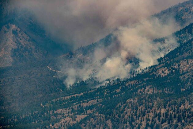 July 1, 2021, Lytton, BC, Canada: A wildfire burns in the mountains above Lytton, B.C., on Thursday, July 1, 2021. Lytton Canada  - ZUMAc35_ 20210701_zaf_c35_226 Copyright: xDarrylxDyckx