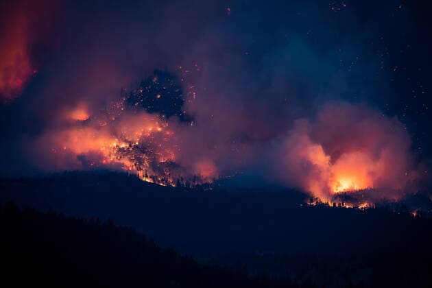 July 1, 2021, Lytton, BC, Canada: A wildfire burns on the side of a mountain in Lytton, B.C., at dusk on Thursday, July 1, 2021. Lytton Canada  - ZUMAc35_ 20210701_zaf_c35_309 Copyright: xDarrylxDyckx