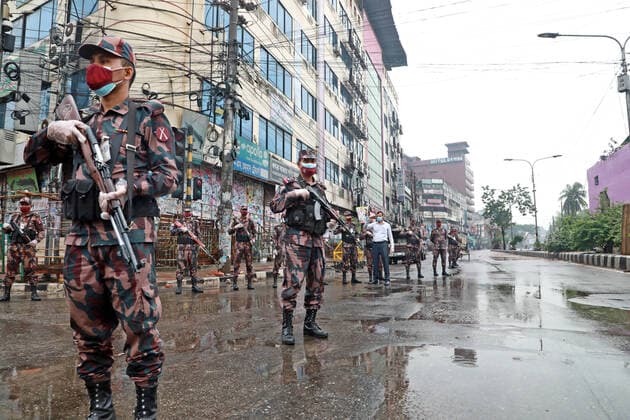 July 2, 2021, Dhaka, Bangladesh: Border Guard soldiers of Bangladesh patrol along a street during a government-imposed lockdown as a preventive measure against the COVID-19. Dhaka Bangladesh - ZUMAr338 20210702_zip_r338_007 Copyright: xHarun-Or-Rashidx