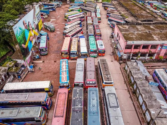 Bangladesh: Buses parked in terminal during nationwide Lockdown (EDITOR S NOTE: Image taken by a drone) An aerial view of buses line up at the Barishal Central Bus Stand, one of the busiest bus-stand in the south region in Bangladesh, amid a week-long nationwide lockdown in Bangladesh to slow down the spread of Covid-19. Barishal Barishal Bangladesh Copyright: MustasinurxRahmanxAlvi
