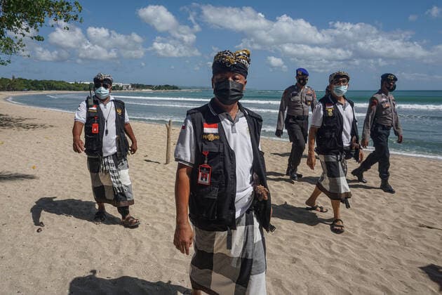 July 3, 2021, Badung, Bali, Indonesia: Famous Bali Kuta Beach is closed during the first day of Java and Bali Emergency Community Activities Restriction (PPKM) implementation. Indonesia central government to impose Emergeny PPKM from July 3 - 20, 2021, to decrease the latest massive Covid-19 surges. Badung Indonesia - ZUMAb245 20210703_zip_b245_015 Copyright: xDickyxBisinglasix