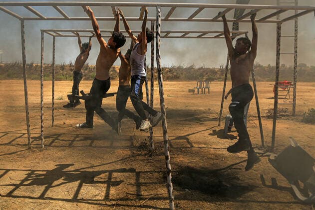 July 4, 2021, Gaza city, Gaza Strip, Palestinian Territory: Young Palestinians take part in a military summer camp organised by the Islamic Jihad Movement, in Gaza City on July 04, 2021 Gaza city Palestinian Territory - ZUMAap3_ 20210704_zaf_ap3_095 Copyright: xDawoudxAboxAlkasx