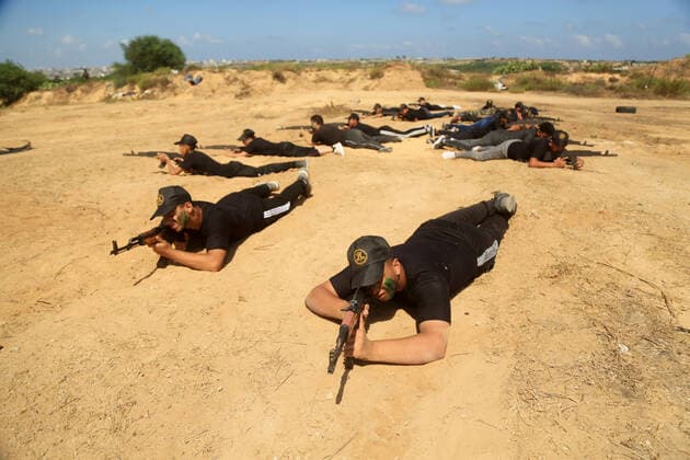 July 4, 2021, Gaza city, Gaza Strip, Palestinian Territory: Young Palestinians take part in a military summer camp organised by the Islamic Jihad Movement, in Gaza City on July 04, 2021 Gaza city Palestinian Territory - ZUMAap3_ 20210704_zaf_ap3_096 Copyright: xDawoudxAboxAlkasx