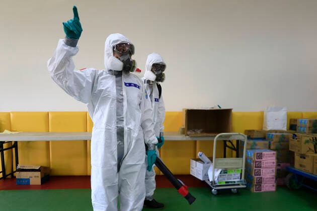 July 5, 2021, Taipei, Taipei, Taiwan: Chemical troop officers with personal protective equipment disinfect a vaccination centre in Taipei, as the island is combating an outbreak with a increasing number of infections and deaths of Covid-19. The island has previously reported cases of Covid delta variant while facing shortage of vaccines that a nationwide level 3 Covid-19 alert has been extended. Taipei Taiwan - ZUMAs313 20210705_zip_s313_003 Copyright: xDanielxCengxShou-Yix