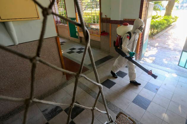 July 5, 2021, Taipei, Taipei, Taiwan: Chemical troop officers with personal protective equipment disinfect a vaccination centre in Taipei, as the island is combating an outbreak with a increasing number of infections and deaths of Covid-19. The island has previously reported cases of Covid delta variant while facing shortage of vaccines that a nationwide level 3 Covid-19 alert has been extended. Taipei Taiwan - ZUMAs313 20210705_zip_s313_004 Copyright: xDanielxCengxShou-Yix
