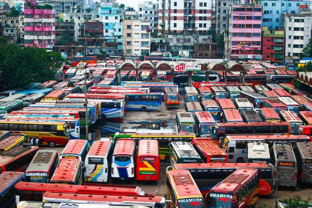 Bangladesh: Buses are not able to run on the road Due to the strict lockdown, no buses are able to run on inter-district routes. In this meantime bus worker s are passing their time by playing card and taking rest in Dhaka. Dhaka Bangladesh Saidabad Bus Stand Copyright: MdxIbrahim