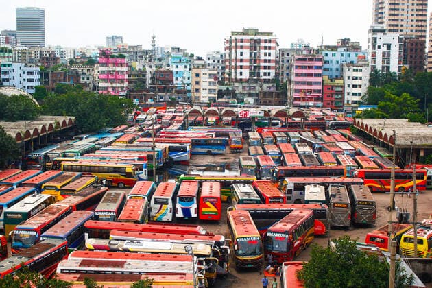 Bangladesh: Buses are not able to run on the road Due to the strict lockdown, no buses are able to run on inter-district routes. In this meantime bus worker s are passing their time by playing card and taking rest in Dhaka. Dhaka Bangladesh Saidabad Bus Stand Copyright: MdxIbrahim