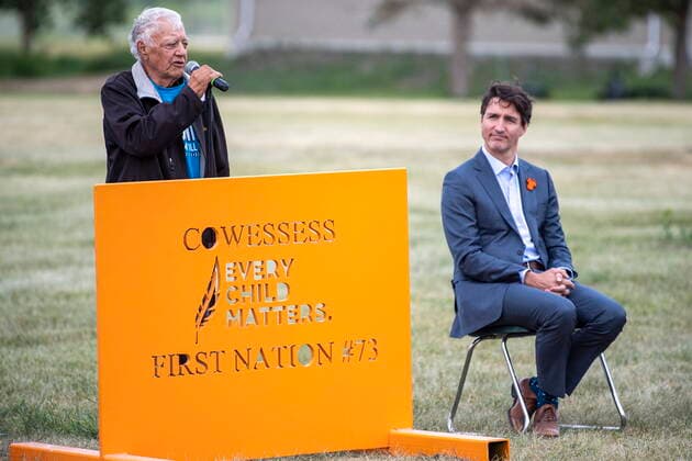 July 6, 2021, Cowessess First Nation, SK, Canada: Residential school survivor Dennis Delorme, left, speaks as Prime Minister Justin Trudeau listens during a ceremony at the site of a former residential school where, last month, ground-penetrating radar detected a potential 751 unmarked graves, in Cowessess First Nation, Sask., Tuesday, July 6, 2021. Cowessess First Nation Canada - ZUMAc35_ 20210706_zaf_c35_082 Copyright: xLiamxRichardsx