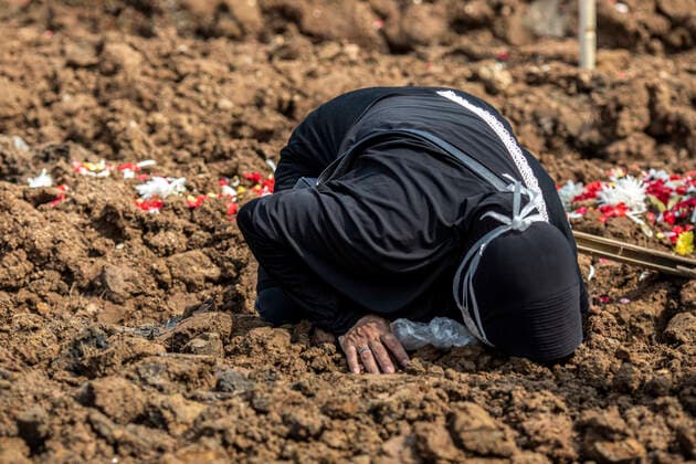 July 7, 2021, North Jakarta, Jakarta, Indonesia: Jakarta, Indonesia, 7 July 2021: Funeral atmosphere at the Rorotan Covid-19 Special Cemetery, North Jakarta. Indonesia has experienced a very significant spike in COVID-19 deaths since Eid al-Fitr. In one day, the Rorotan Covid-19 special funeral received more than 100 bodies. North Jakarta Indonesia - ZUMAh128 20210707_zap_h128_015 Copyright: xDonalxHusnix