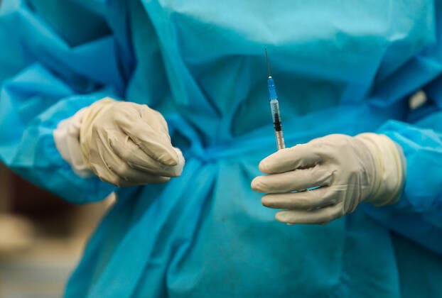 July 7, 2021, colombo, Sri Lanka: A Sri Lankan Army Medical officer prepares to administers a dose of Pfizer-BioNTech COVID-19 Vaccine at Army Hospital vaccination site in Colombo, Sri Lanka, July 7, 2021. Sri Lankan health authorities on Wednesday began rolling out doses of the Pfizer vaccine for those who have received only the first dose of the AstraZeneca vaccine colombo Sri Lanka. - ZUMAd152 20210707_znp_d152_008 Copyright: xPradeepxDambaragex