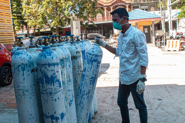 Increased Oxygen Usage Officers check oxygen-filled cylinders before being distributed to Covid-19 patient rooms at the Covid-19 referral hospital in Palu, Central Sulawesi, Indonesia, Wednesday 7 July 2021. The use of oxygen has increased along with the increase in Covid-19 patients being treated at this hospital. Although the number of patients infected with Covid-19 has increased in Palu, the availability of oxygen is sufficient and there is no shortage.  Copyright: xOpanxBustanx xOpnxImagesx