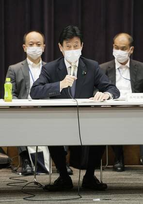 Tokyo to enter another COVID-19 state of emergency during Olympics Japanese economic revitalization minister Yasutoshi Nishimura (C), who is also in charge of the country s coronavirus response, speaks during a COVID-19 expert panel meeting in Tokyo on July 8, 2021. The government is set to decide later in the day to place Tokyo under another COVID-19 state of emergency until Aug. 22, covering the duration of the Olympics in an effort to curb a recent surge in infections. 