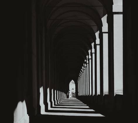 woman walking through arches in Bologna Black and white photo of a woman walking through some of the many arches in the Italian city of Bologna Bologna Italy *** Frau zu Fuß durch Bögen in Bologna Schwarz-Weiß-Foto von einer Frau zu Fuß durch einige der vielen Bögen in der italienischen Stadt Bologna Bologna Italien Copyright: xCarlosxPeralesx