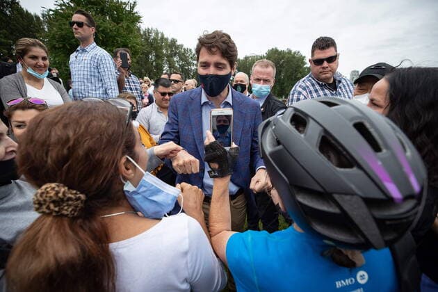 July 8, 2021, Coquitlam, BC, Canada: Prime Minister Justin Trudeau greets people in the crowd as he arrives for an announcement and news conference at Lafarge Lake Park, in Coquitlam, B.C., on Thursday, July 8, 2021. Coquitlam Canada  - ZUMAc35_ 20210708_zaf_c35_036 Copyright: xDarrylxDyckx
