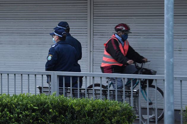 NSW POLICE COVID19 COMPLIANCE, Police are walking in the shopping district in the southwestern suburb of Fairfield in Sydney, Friday, July 9, 2021. At least 100 more police will be deployed to southwest Sydney from Friday in a high-visibility operation to ensure compliance with public health orders. ( NO ARCHIVING, EDITORIAL USE ONLY, NO USE IN BOOKS WITHOUT CONSENT SYDNEY NSW AUSTRALIA  Copyright: xMICKxTSIKASx 20210709001555892077
