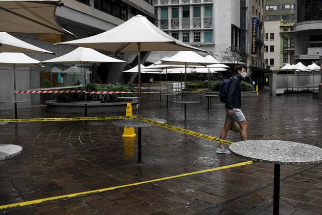NSW CORONAVIRUS COVID19, A man wears as face mask as he walks a closed food court in the central business district of Sydney, Friday, July 9, 2021. NSW recorded 44 new locally acquired cases of COVID-19 in the 24 hours to 8pm last night. ( NO ARCHIVING, EDITORIAL USE ONLY, NO USE IN BOOKS WITHOUT CONSENT SYDNEY NSW AUSTRALIA  Copyright: xBIANCAxDExMARCHIx 20210709001555953018
