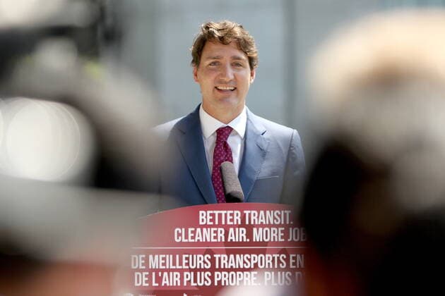 July 9, 2021, Surrey, BC, Canada: Prime Minister Justin Trudeau answers questions from reporters following a transit announcement during a press conference at Surrey City Hall in Surrey, B.C., on Friday, July 9, 202. Surrey Canada  - ZUMAc35_ 20210709_zaf_c35_039 Copyright: xChadxHipolitox