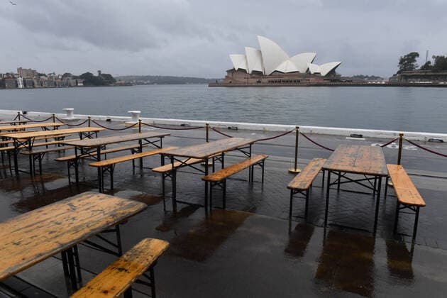 NSW COVID19 LOCKDOWN RESTRICTIONS, Empty tables from a closed restaurant are seen in front of the Sydney Opera House in Sydney, Saturday, July 10, 2021. Tough new restrictions are now in place for Greater Sydney after another spike in COVID-19 cases. ( NO ARCHIVING, EDITORIAL USE ONLY, NO USE IN BOOKS WITHOUT CONSENT SYDNEY NSW AUSTRALIA  Copyright: xMICKxTSIKASx 20210710001556199235
