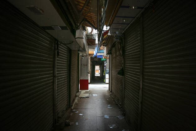 NEW DELHI, INDIA JULY 10: A deserted view of Gaffar Market after the Delhi Disaster Management Authority (DDMA) on Friday ordered temporary closure of Gaffar Market and Naiwala Market in central Delhi?s Karol Bagh -- popular for car accessories and electronic gadgets -- for at least two days, citing violation of Covid-19 regulations, on July 10, 2021 in New Delhi, India. In the last 10 days, the authorities have similarly cracked down on at least nine such popular markets in the city, including the Lajpat Nagar Central Market and Laxmi Nagar market. (Photo by Sanchit Khanna Hindustan Times ) Two Karol Bagh Markets Temporarily Closed Over Violation Of Covid Norms