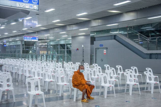 July 11, 2021, Bangkok, Thailand: A Buddhist monk waits to be vaccinated with AstraZeneca vaccine during a mass vaccination against COVID-19 at Bang Sue Grand Station in Bangkok. .Thailand has a record high of 86 new Covid-19 fatalities and 9,539 new cases over the past 24 hours, the Public Health Ministry reported. Bangkok Thailand - ZUMAs197 20210711_zaa_s197_079 Copyright: xPeeraponxBoonyakiatx