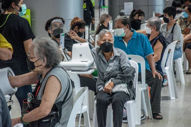 July 11, 2021, Bangkok, Thailand: People check their blood pressure before receiving a shot of AstraZeneca during a vaccination against COVID-19 at Bang Sue Grand Station in Bangkok. .Thailand has a record high of 86 new Covid-19 fatalities and 9,539 new cases over the past 24 hours, the Public Health Ministry reported. Bangkok Thailand - ZUMAs197 20210711_zaa_s197_082 Copyright: xPeeraponxBoonyakiatx
