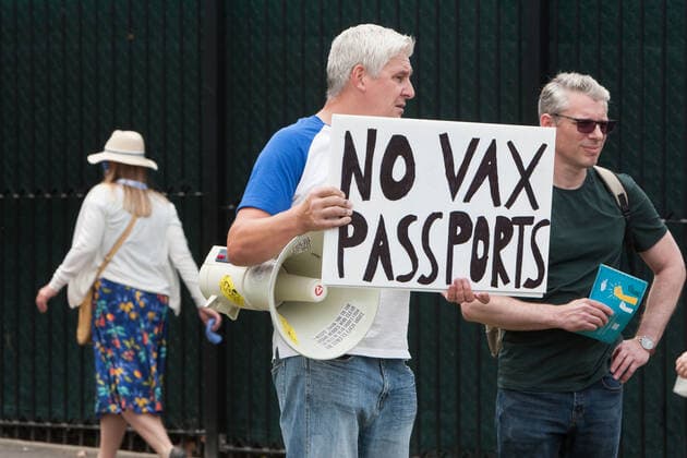 July 11, 2021, London, United Kingdom: A protester holds a placard expressing his opinion outside Centre Court during the demonstration..Demonstrators protest outside Wimbledon tennis tournament on Men s Finals Day as they call for freedom of choice, medical freedom with no Covid checks necessary to gain access to major sporting events and no vaccine passports. London United Kingdom - ZUMAs197 20210711_zaa_s197_139 Copyright: xMartinxPopex